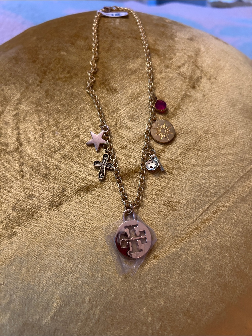Gold-Tone Charm Necklace with Pink Accent